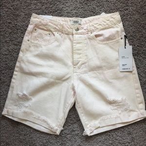 Distressed shorts.